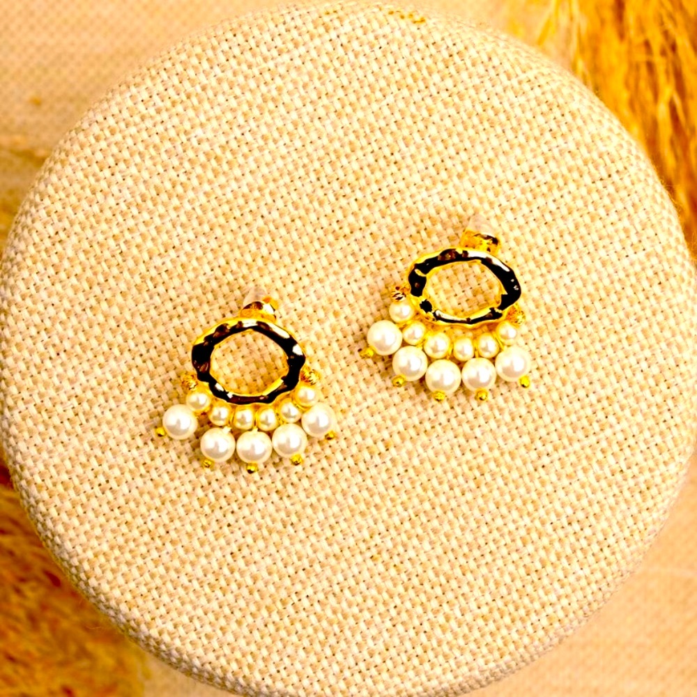New two - tone gold earrings .